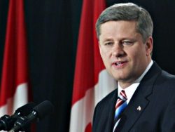 Harper minimise l'importance de la baisse du taux d'intérêt directeur