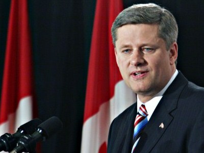 Harper minimise l'importance de la baisse du taux d'intérêt directeur