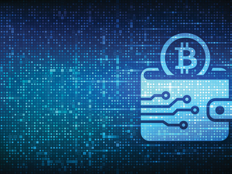 Un bitcoin qui semble sortir d'un portefeuille numérique.